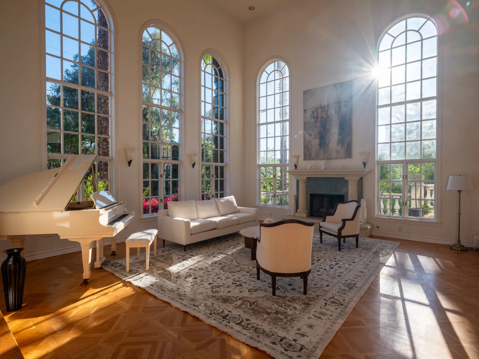 Italian Villa Estate great room with a white grand piano